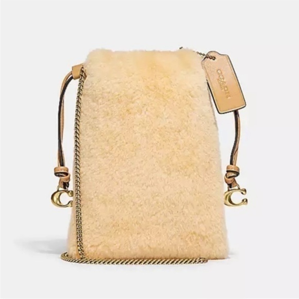 Coach natural shearling mini drawstring crossbody NWT